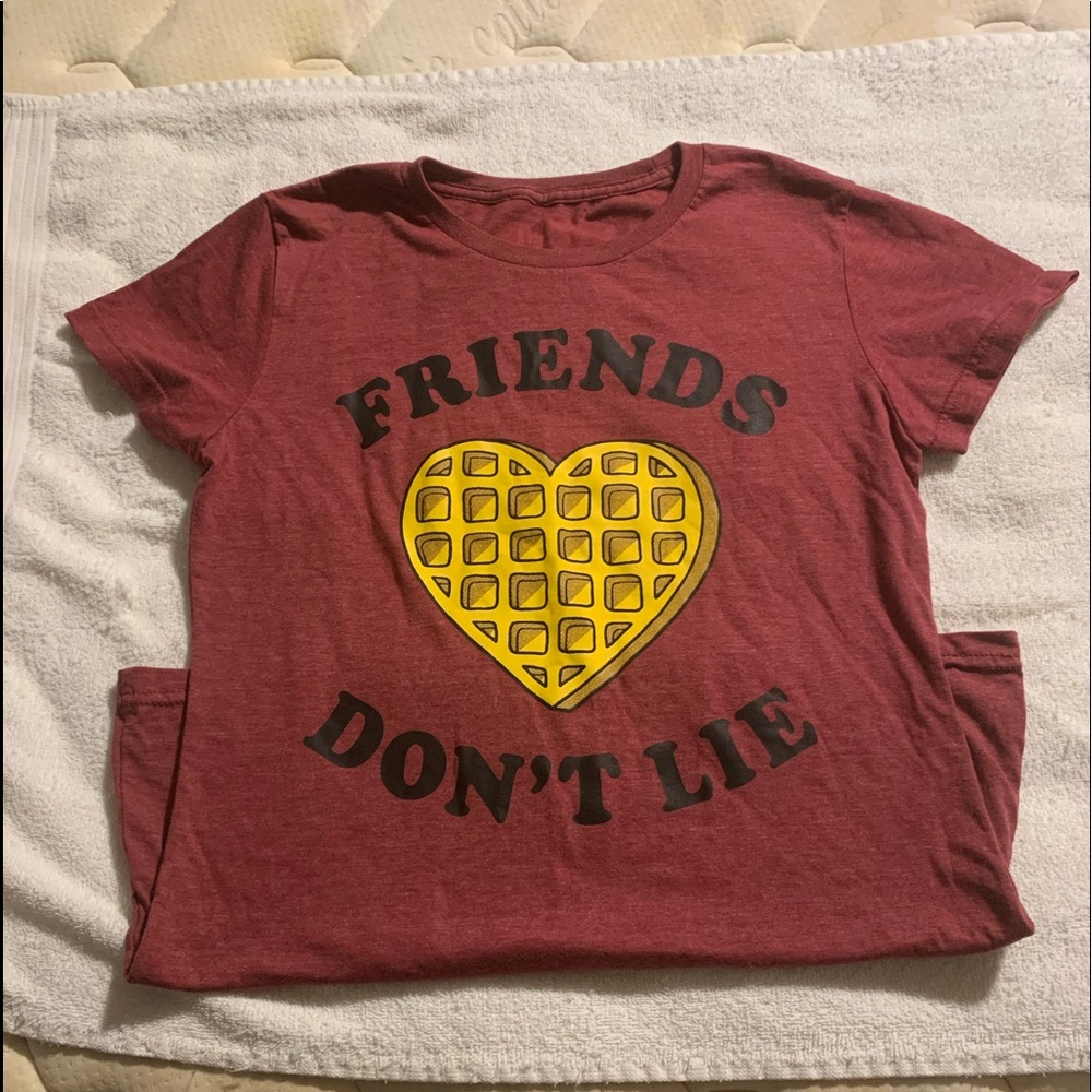 Kids size large, Stranger Things shirt.